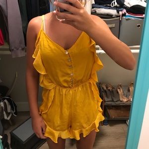 NEVER WORN YELLOW RUFFLE ROMPER!!